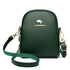 Dark green small zip-up backpack with a top handle and gold-tone hardware.