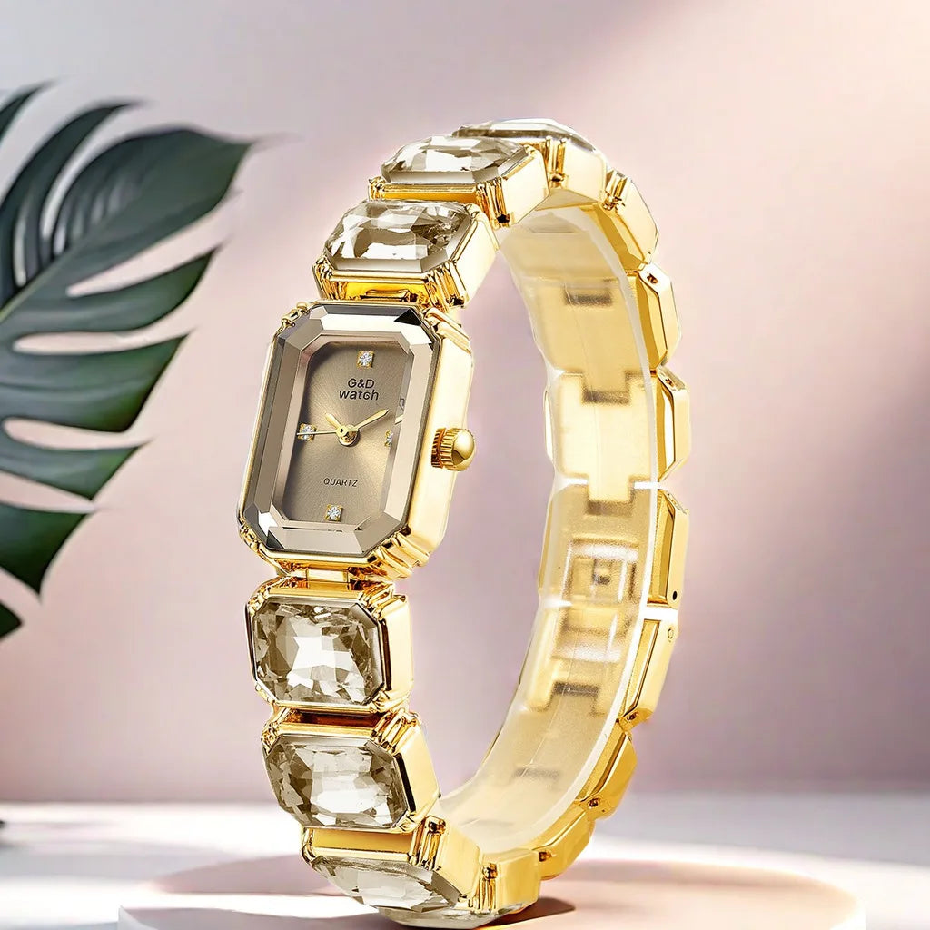 Gold Bracelet Watch for Women Rectangular Dial with clear decorative stones on the bracelet against a pink background