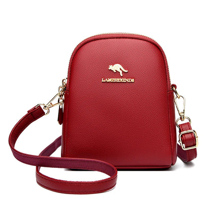 Zip-Up Backpack for Women in red with a top handle, shoulder straps, and gold-tone hardware