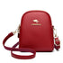 Zip-Up Backpack for Women in red with a top handle, shoulder straps, and gold-tone hardware
