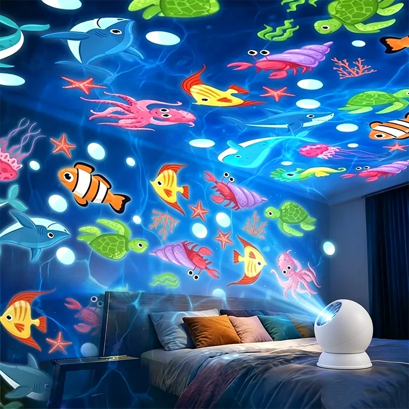 Colorful ocean projector displaying fish and sea creatures across a bedroom ceiling and walls..